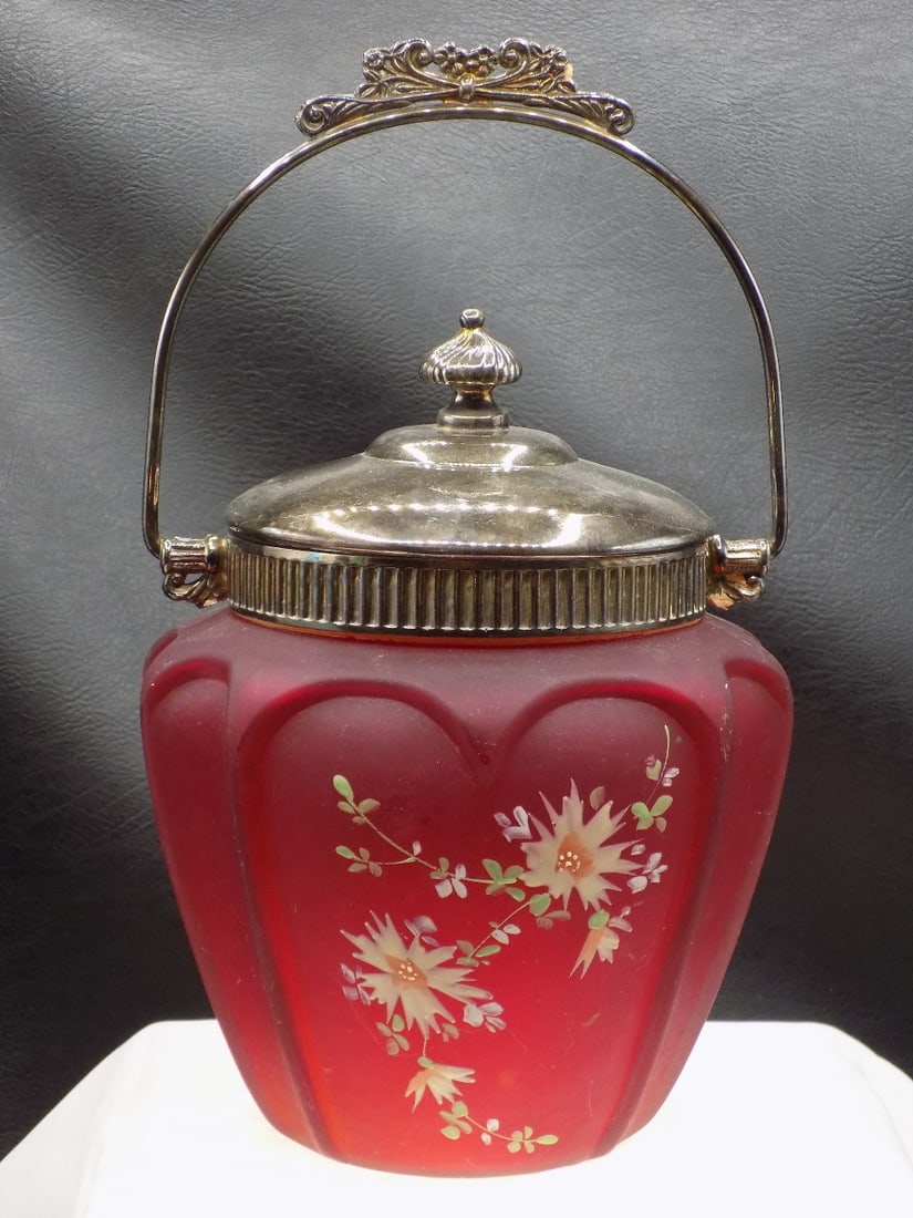Beautiful antique red satin glass art glass biscuit jar: Beautiful antique red satin glass art glass biscuit jar by Consolidated Glass Company. Enamel decorated flowers on two sides. Beautiful colors. In very good original as found condition. Great quality