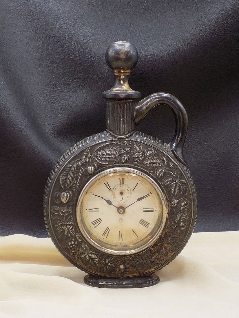 Ornate Ansonia clock in shape of jug (1 of 5)