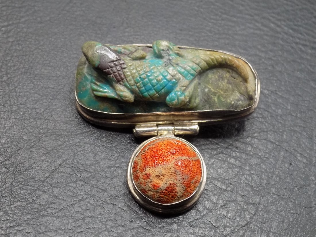 Vintage hand carved turquoise lizard sterling silver pendant: Vintage hand carved turquoise lizard sterling silver pendant. With coral. Marked as shown in photo. Beautiful colors. In very good original as found condition. Great quality and detail. 2 inches wide 