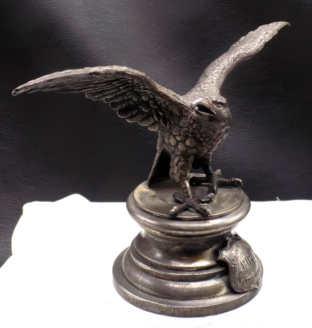 Great antique metal eagle pocket watch holder with advertising (1 of 7)