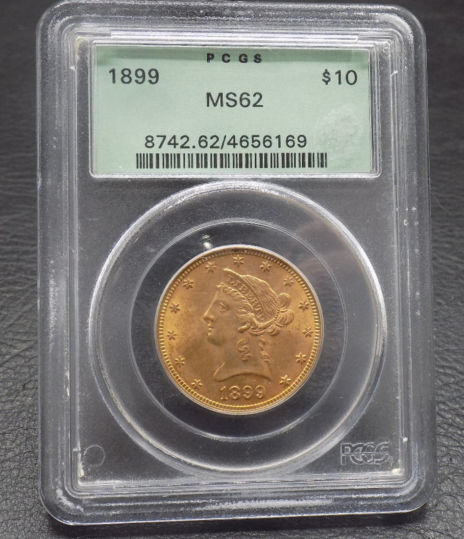 1899 ten dollar gold coin graded MS62 by PCGS: 1899 ten dollar gold coin graded MS62 by PCGS. No credit cards for gold coins. Payment through Live Auctioneer or cashier’s check. No shipping outside of United States. In house shipping only.