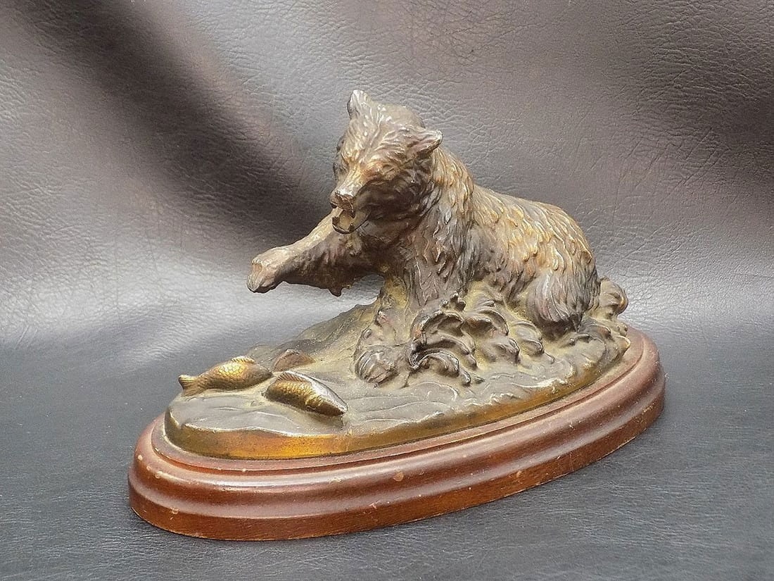 Splendid artist signed bronze bear fishing: Splendid artist signed bronze bear fishing. Original patina. On wood base. Artist signed as shown in photo. In very good original as found condition. Great quality and detail. 5 3/8 inches tall x 8