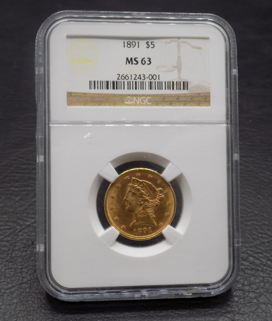 1891 five dollar gold coin graded MS63 by NGC.: 1891 five dollar gold coin graded MS63 by NGC. 172 known to exist. No credit cards for gold coins. Payment through Live Auctioneer or cashier’s check. No shipping outside of United States. In house