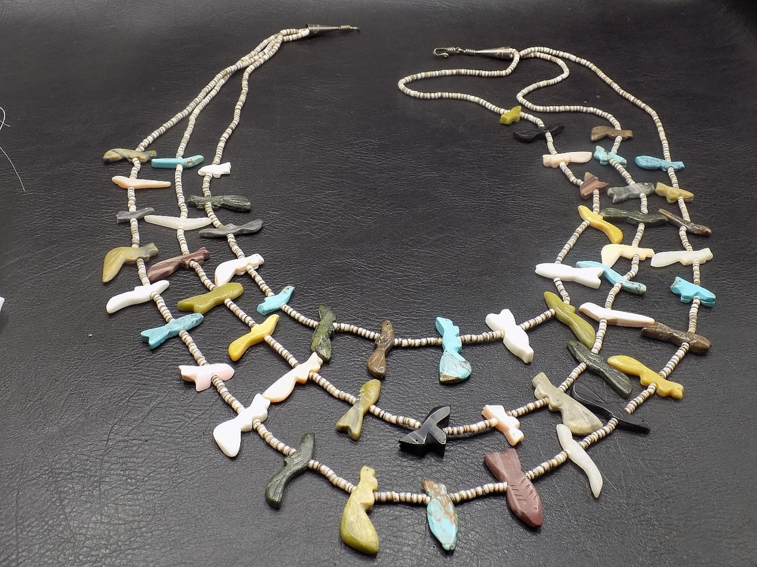 Vintage Native American Indian multi strand fetish necklace.: Vintage Native American Indian multi strand fetish necklace. Hand carved animal fetishes in turquoise, mother of pearl, jet and other semiprecious stones. Likely Zuni or Santo Domingo Pueblo.