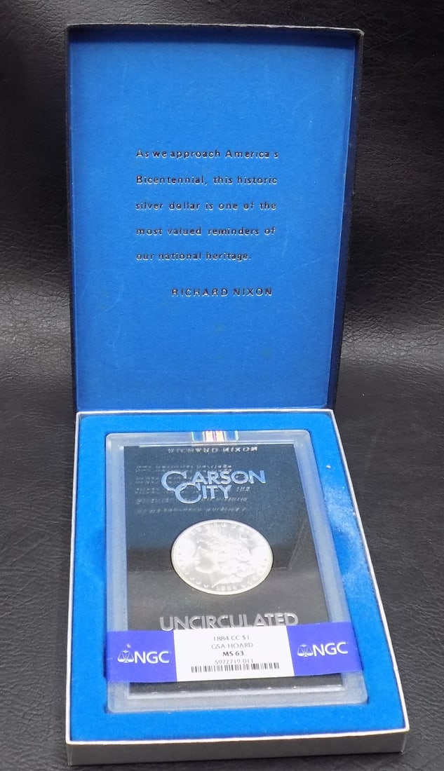 Uncirculated GSA 1884 Carson City Morgan silver dollar: Uncirculated GSA 1884 Carson City Morgan silver dollar, Graded MS63 by NGC. Brilliant in Holder w/Box & COA. Please see photos. For in house shipping, please call Mike at Thriftiques 319-321-0613. You
