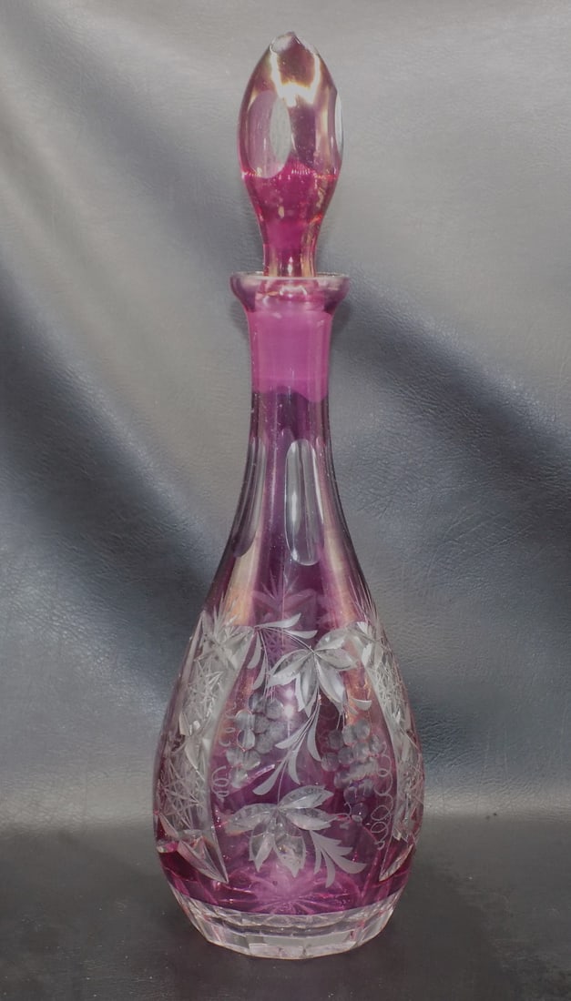 Vintage Nachtmann Traube colored cut to clear decanter: Vintage Nachtmann Traube colored cut to clear decanter. Beautiful colors. In very good original as found condition. Great quality and detail. 14 ¾ inches tall. Matches lot 168. For in house shipp