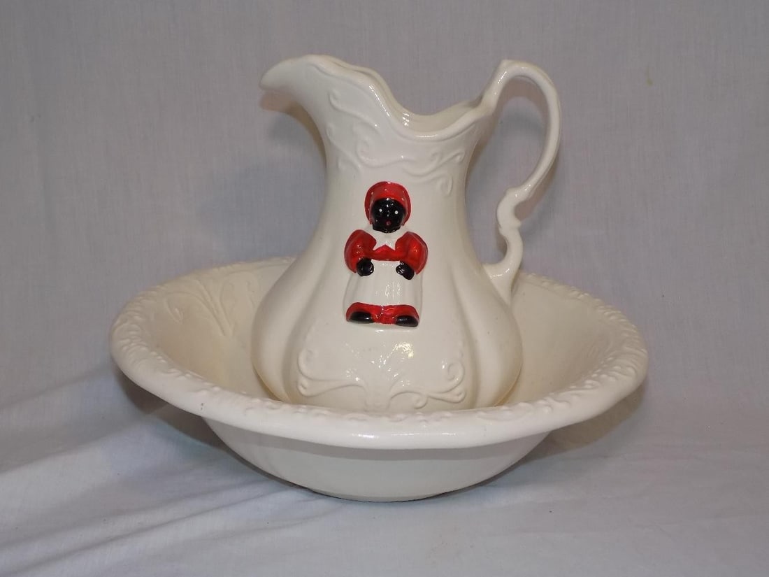 Vintage Black Americana washbowl and pitcher: Vintage Black Americana washbowl and pitcher. Marked on bottom as shown in photo. In very good original as found condition. Great quality and detail. Bowl 11 ¼ wide. Pitcher 15 ½ inches tall