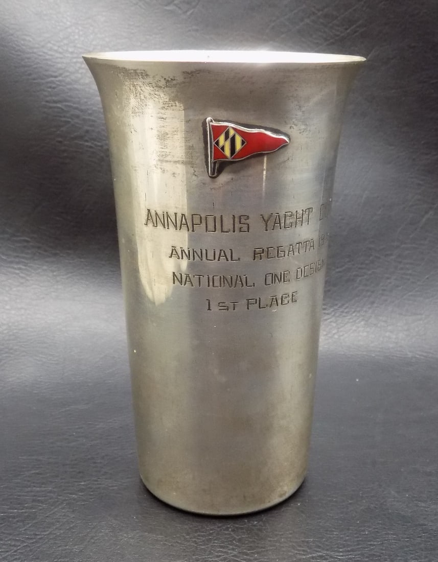 1946 sterling silver Annapolis Yacht Club Trophy First Place: 1946 sterling silver Annapolis Yacht Club Trophy First Place. 5 ¼ inches tall x 3 wide at top rim. Marked as shown in photo. 175.5 grams. In very good original as found condition. Great quality a