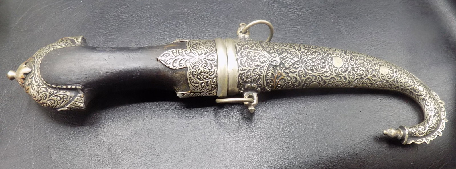 Fancy antique Koummva Jambiya dagger: Fancy antique Koummva Jambiya dagger. Wood handle with ornate decorated silver scabbard. In very good original as found condition. Great quality and detail. 14 ½ inches long. For in house shipp