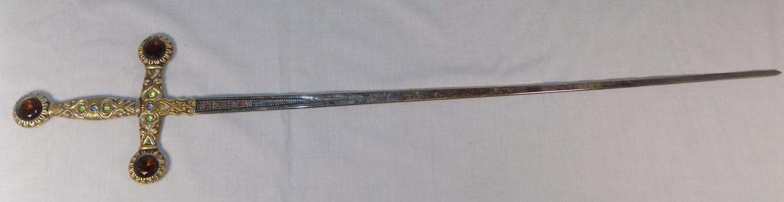 Fancy vintage sword with jeweled handle. (1 of 4)