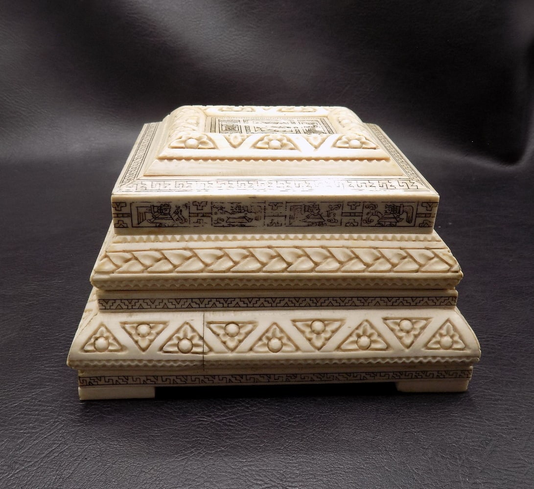 vintage elaborate hand carved jewelry or trinket box: vintage elaborate hand carved jewelry or trinket box. Appears to be hard plastic over wood. In very good original as found condition. Great quality and detail. 3 ½ tall x 6 ½ wide x 5 ½