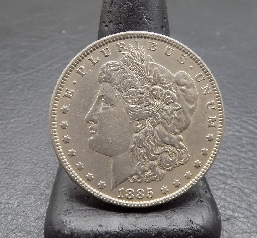 Uncirculated 1891 Morgan silver dollar: Uncirculated 1891 Morgan silver dollar. Please see photos. For in house shipping, please call Mike at Thriftiques 319-321-0613