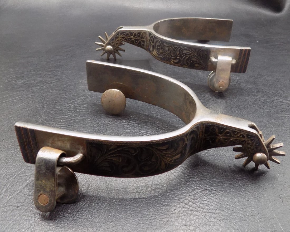Vintage highly engraved cowboy spurs (1 of 5)