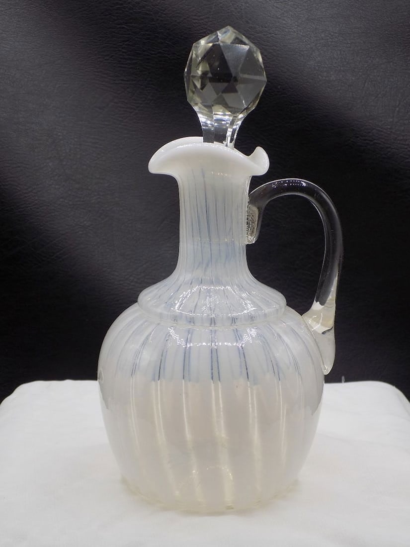 Vintage Fenton French opalescent spiral optic glass cruet: Vintage Fenton French opalescent spiral optic glass cruet. Beautiful colors. In very good original as found condition. Great quality and detail. White lines are camera flash reflection. 7 ¼ inche