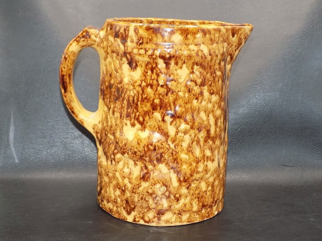 Antique Bennington pottery pitcher with blown out foliage and peacock (1 of 5)