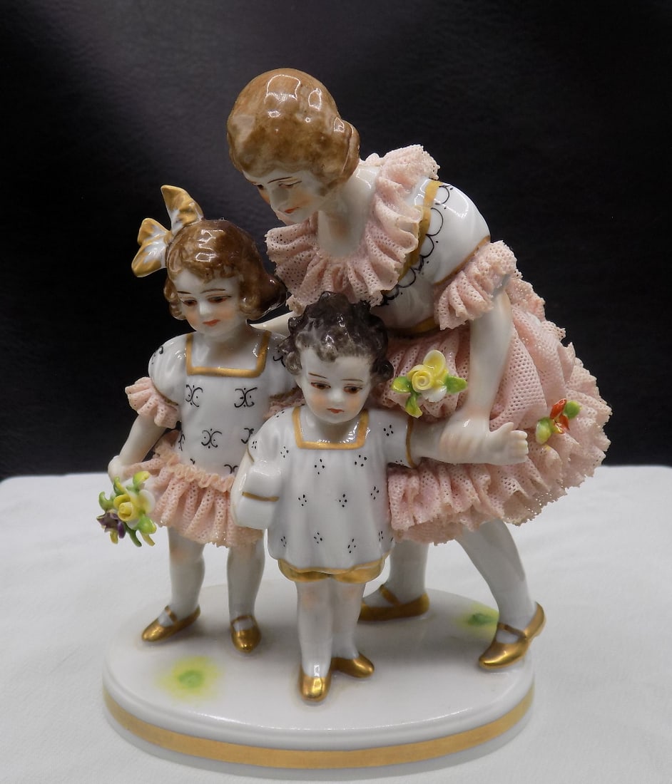 Fabulous 1800’s German Sitzendorf Hand painted porcelain figural grouping: Fabulous 1800’s German Sitzendorf Hand painted porcelain figural grouping. With damage to skirt on back as shown in photo. Marked on bottom as shown in photo. Great quality and detail. 4 7/8 inc