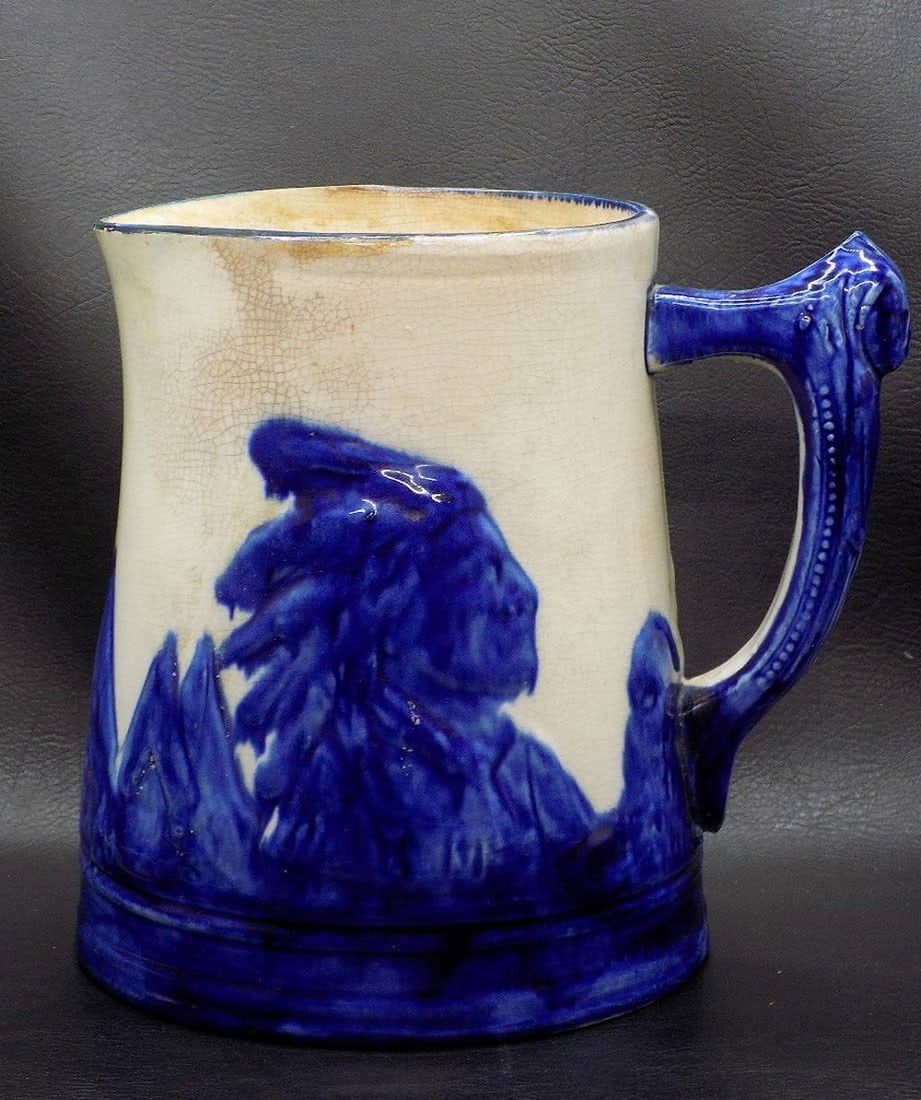 Nice vintage Sleepy Eye Pitcher. With Native American Indian and teepee: Nice vintage Sleepy Eye Pitcher. With Native American Indian and teepee. Beautiful colors. Has hairline and crazing on inside from age as shown in photo. 7 ½ inches tall. For in house shipping, p