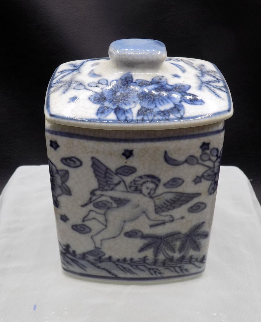Antique blue and white porcelain cherub and floral canister (1 of 4)