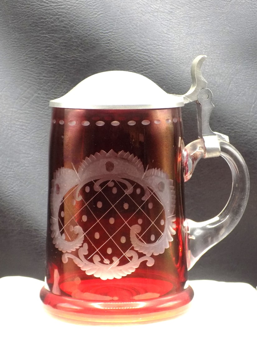 Vintage Bohemian cranberry to clear art glass stein: Vintage Bohemian cranberry to clear art glass stein. Beautiful colors. In very good original as found condition. Great quality and detail. 6 inches tall to top of lid. For in house shipping, please ca