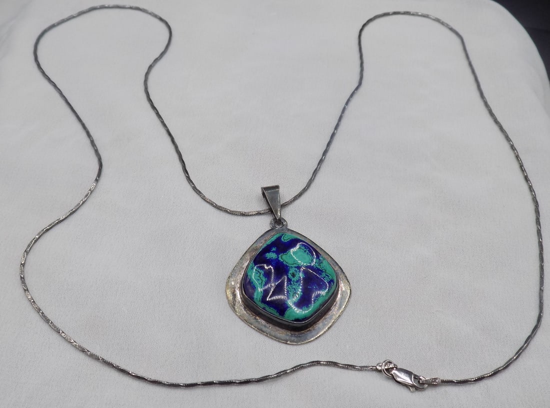 Azurite and malachite sterling pendant necklace: Azurite and malachite sterling pendant necklace. Beautiful colors. In very good original as found condition. Great quality and detail. White lines or dots are camera flash reflection Stone size 1 1/8 