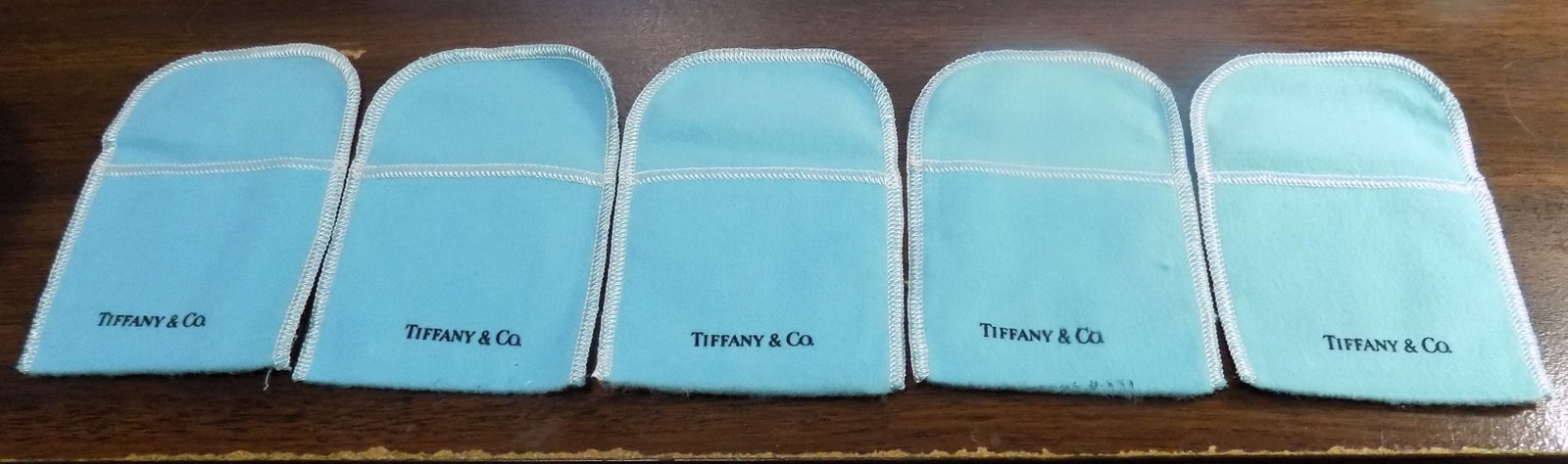 Five authentic vintage Tiffany cloth jewelry bags (1 of 3)