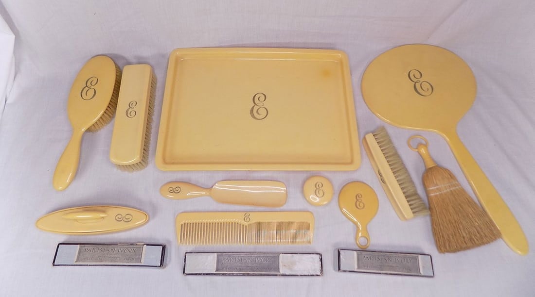 Vintage Parisian ivory Loonen France dresser set: Vintage Parisian ivory Loonen France dresser set. Great quality and detail. Hard to find a set with this many pieces. Fourteen pieces. Tray measures 12 ¾ by 9 inches. 3 .5 pounds. In very good or