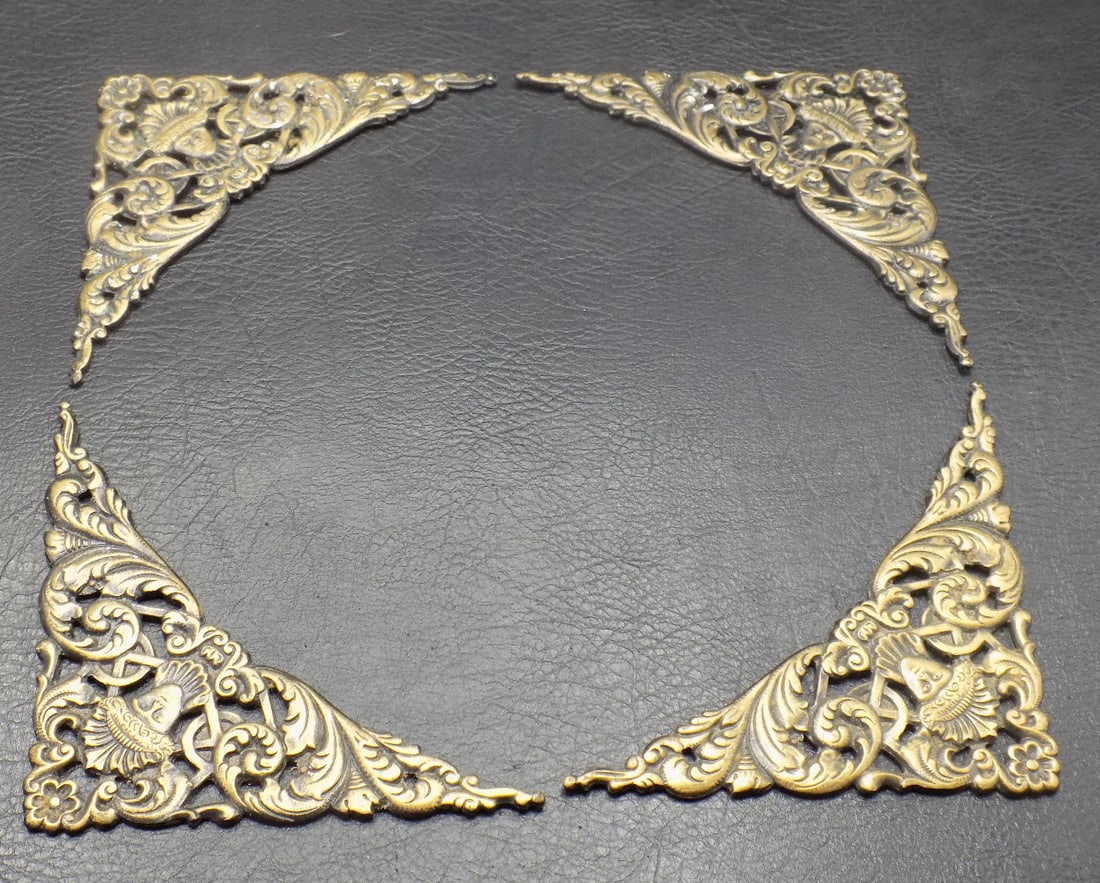 Fancy vintage complete set of metal spandrels: Fancy vintage complete set of metal spandrels. In very good original as found condition. Great quality and detail. One side is 3 ½ inches at corner. 2 ounces. For in house shipping, please call M