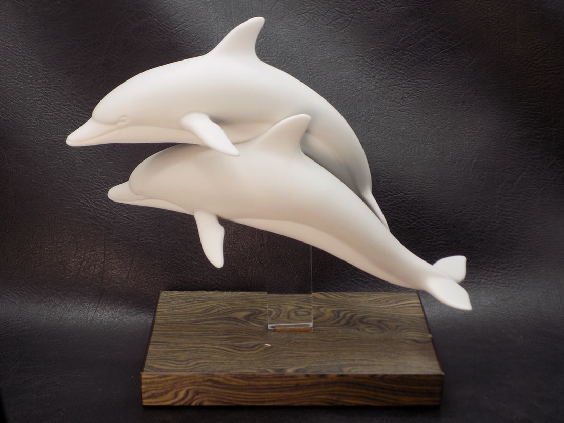Wonderful Lladro pair of porcelain dolphins: Wonderful Lladro pair of porcelain dolphins. Marked as shown in photos. Mounted on wood base. Beautiful colors. In very good original as found condition. Great quality and detail. 7 ¾ tall x 7 &#