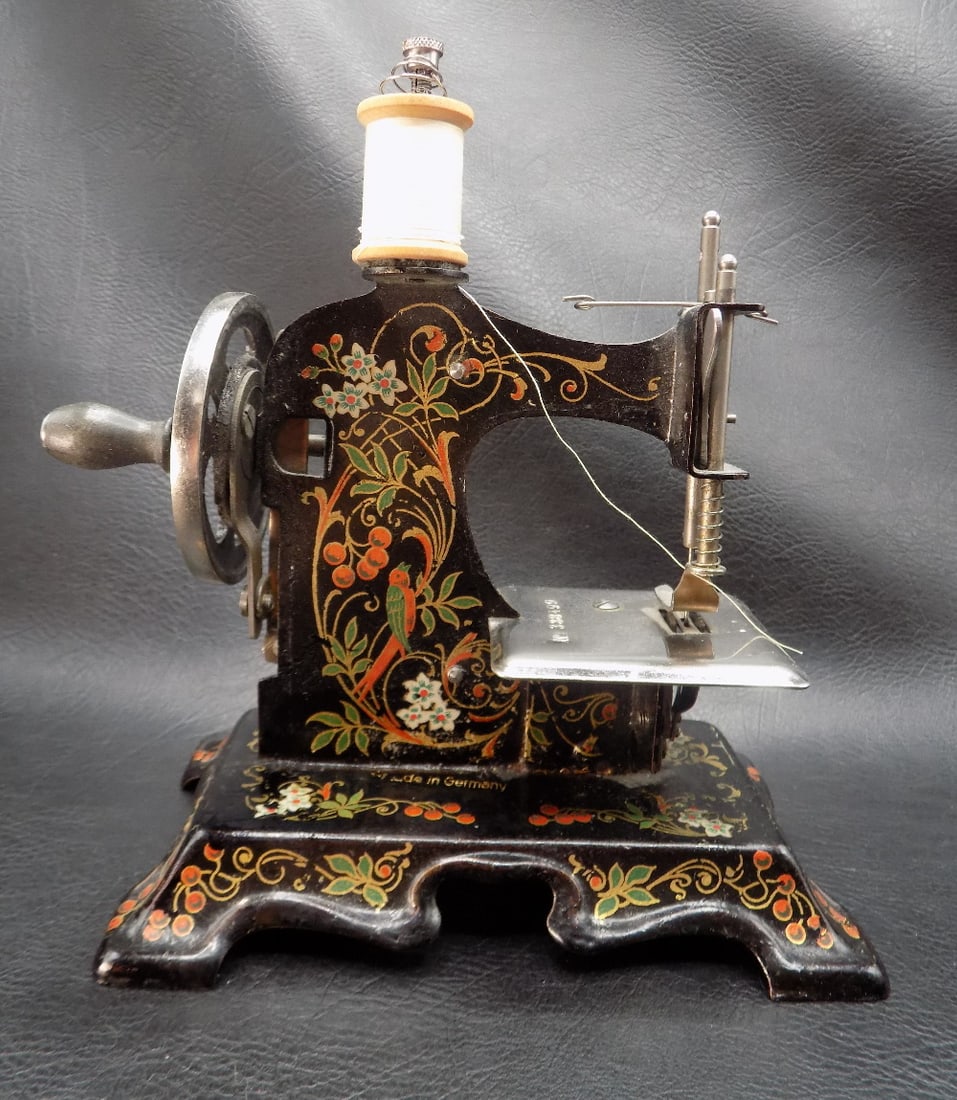 Beautifully decorated antique German child’s sewing machine (1 of 6)