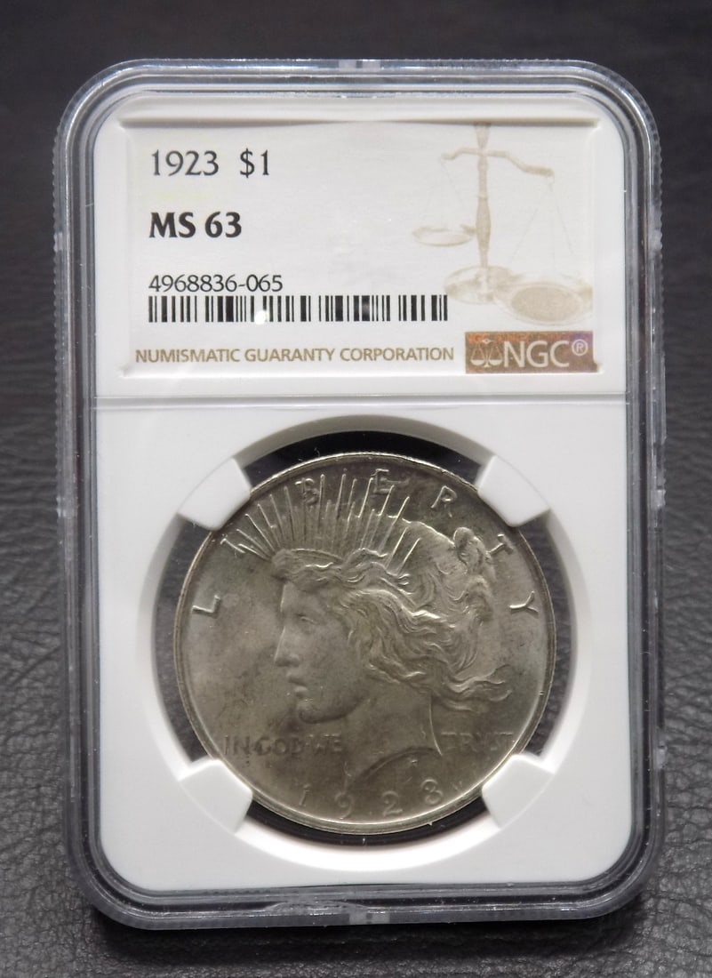 1923 Uncirculated MS 63 silver dollar graded by NGC (1 of 4)