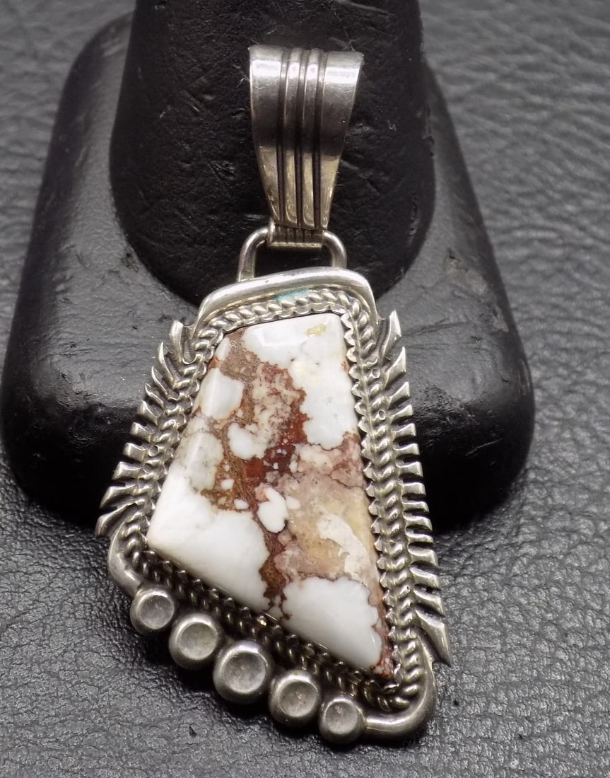 Native American Indian Wild Horse turquoise in sterling silver pendant: Native American Indian Wild Horse turquoise in sterling silver pendant. Marked L T B. Navajo Silversmith. Loren Thomas Begay. Beautiful colors. In very good original as found condition. Great quality 
