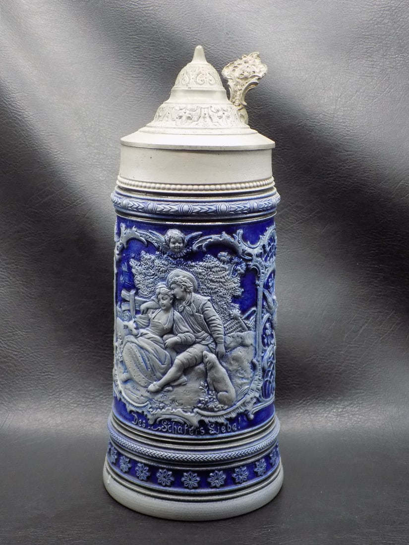 Large vintage German beer stein with three dimensional decoration (1 of 11)
