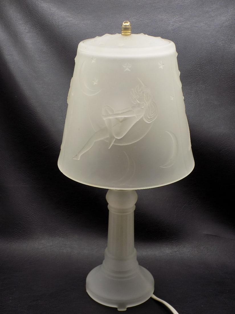 Vintage Art Nouveau lamp with lady in the moon: Vintage Art Nouveau lamp with lady in the moon. In very good original as found condition. Great quality and detail. 14 ¾ inches tall. Small flea bite on base as shown. Does not distract. 4 pounds