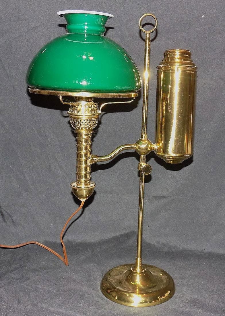 Antique brass kerosene student lamp: Antique brass kerosene student lamp. Has been electrified. Beautiful colors. In very good original as found condition. Great quality and detail. 21 inches tall to top of ring. 12 inches wide. pound ou
