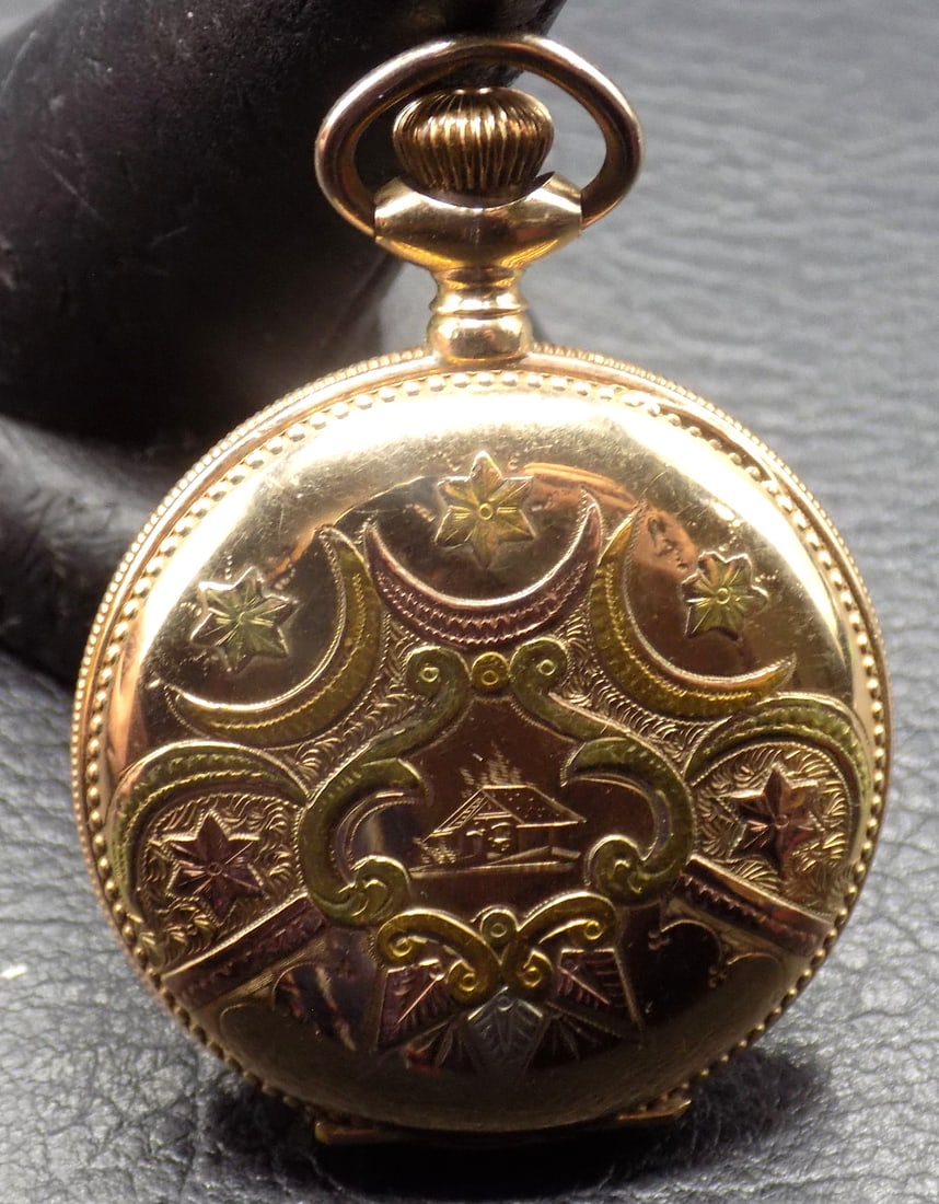 Antique 14k multi color gold hunting case pocket watch: Antique 14k multi color gold hunting case pocket watch. 17 jewel. Running at time of listing. Porcelain dial. Please see photos for serial number and maker on back of works. Beautiful colors. In very 