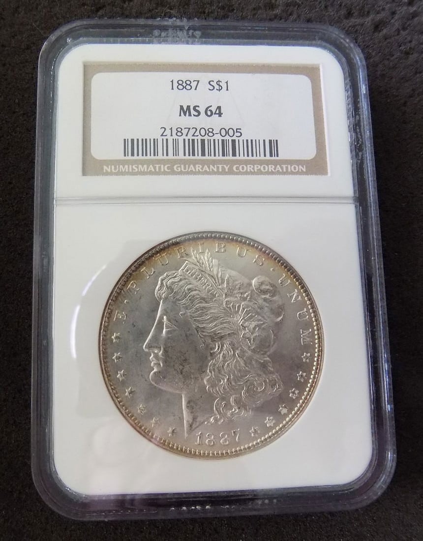 Uncirculated 1887 NGC graded MS64 Morgan silver dollar (1 of 5)