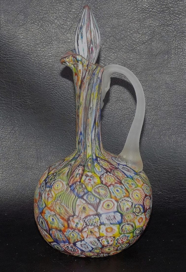 Beautiful Fratelli Toso Murano millefiori art glass cruet: Beautiful Fratelli Toso Murano millefiori art glass cruet. Beautiful colors. In very good original as found condition. Great quality and detail. 7 5/8 inches tall. 10 ounces. For in house shipping, pl
