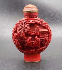 Vintage intricate carved Chinese red cinnabar snuff bottle