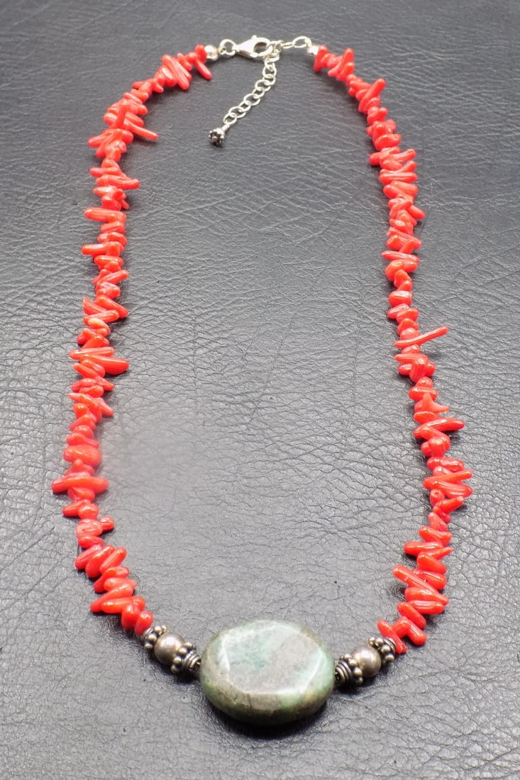 Vintage coral and turquoise necklace with sterling beads: Vintage coral and turquoise necklace with sterling beads. Probably Native American Indian. Beautiful colors. In very good original as found condition. Great quality and detail. 19 inches total length.