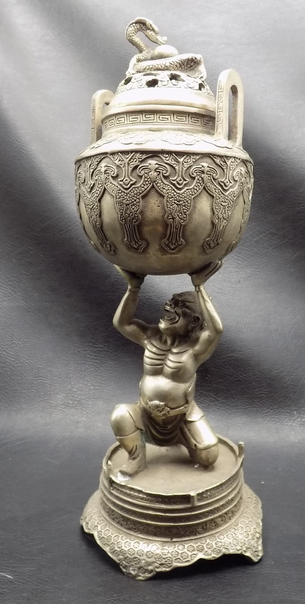 Antique Chinese incense burner with Neo Guardian and dragon: Antique Chinese incense burner with Neo Guardian and dragon finial. Original silver finish patina on bronze. In very good original as found condition. Great quality and detail. 11 ¾ inches tall. 