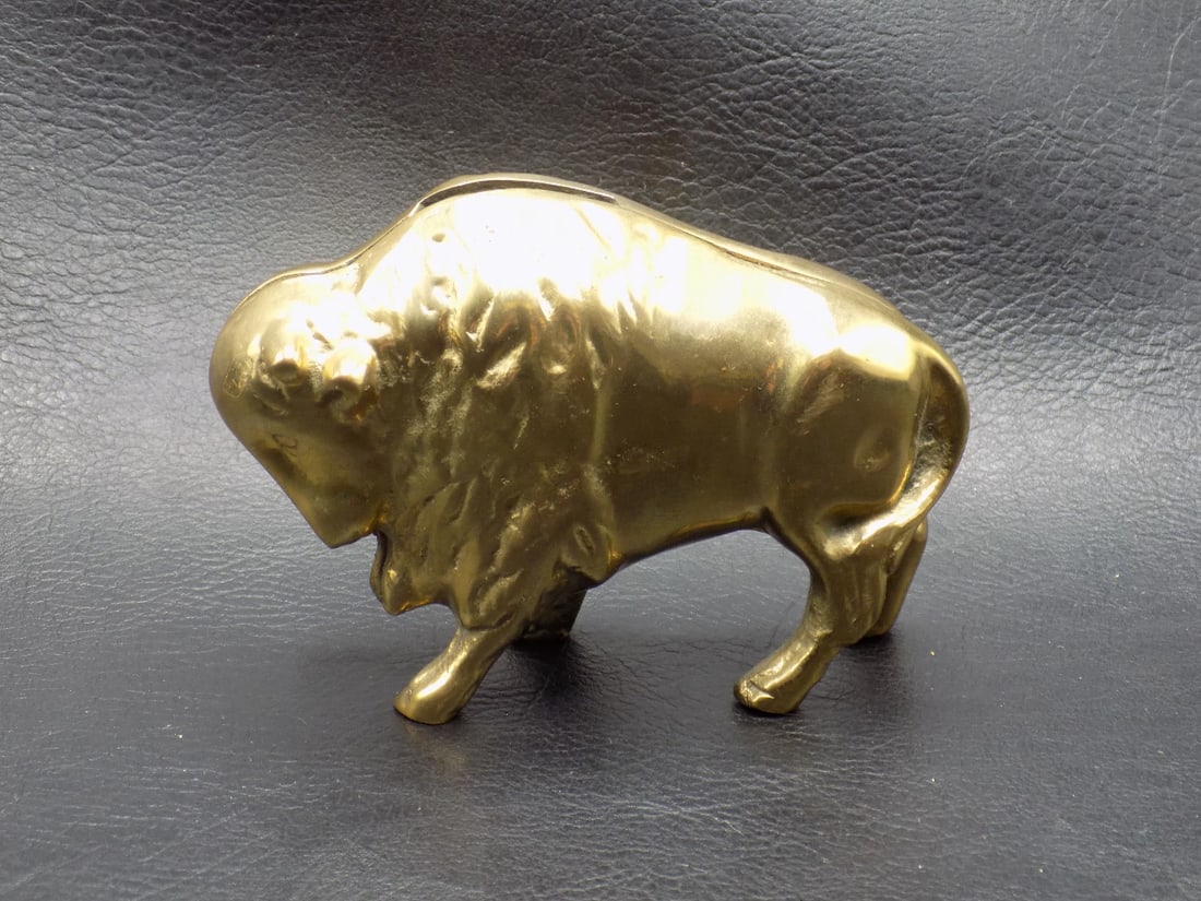 Early 1900s antique cast brass Buffalo Bank: Early 1900s antique cast brass Buffalo Bank. In very good original as found condition. Great quality and detail. All areas showing white is camera reflection. 3 inches tall x 4 long x 1 ½ wide.