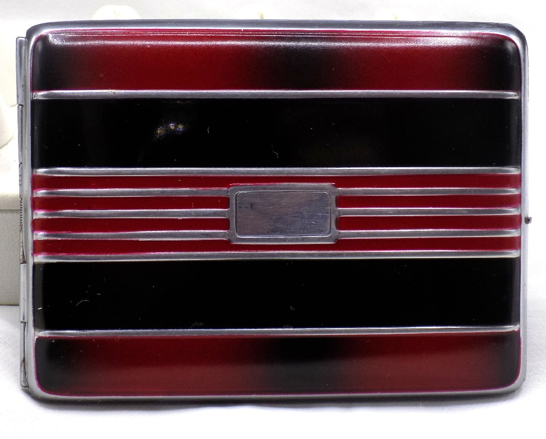 Art Deco multi color metal business card holder: Art Deco multi color metal business card holder. Three dimensional on front. Vibrant colors. In very good original condition and patina. Great quality and detail. 4 1/8 wide x 3 1/8 inches. 1/2 thick.
