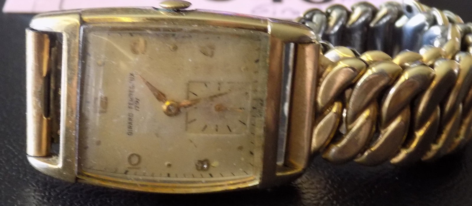 Vintage 14k gold fill Girard Perregaux watch running: Vintage 14k gold fill Girard Perregaux watch running. Watch band needs slight repair. In very good original as found condition. Great quality and detail. 1 ½ by 1 inch . For in house shipping, 