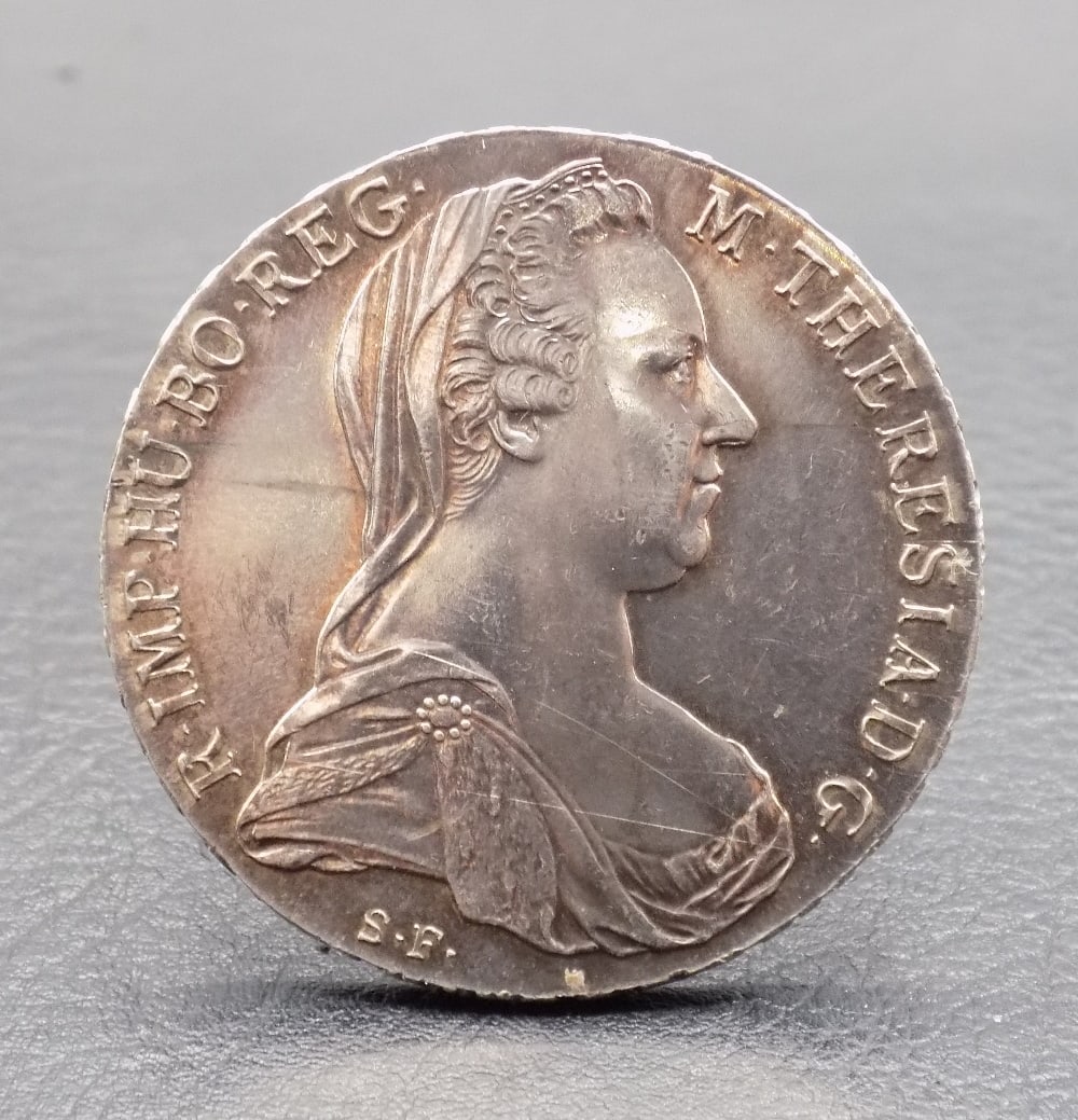 1780 Austria Maria Theresa Thaler silver coin: 1780 Austria Maria Theresa Thaler silver coin. Please see photos for condition. For in house shipping. Please call Mike at Thriftiques 319-321-0613. Click the preferred shipping method for in house sh
