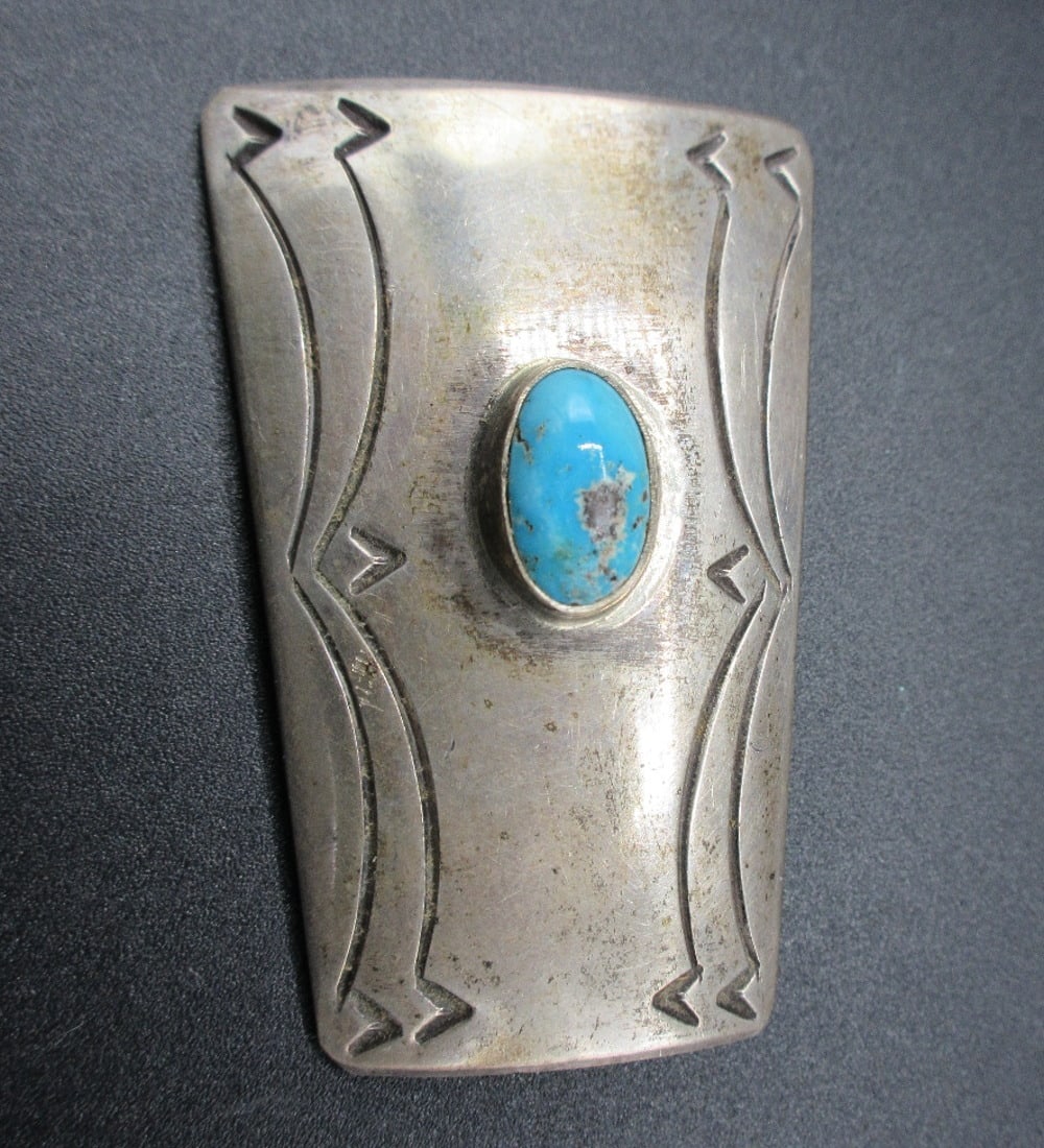 Vintage native American artist signed turquoise and sterling bolo tie: Vintage native American artist signed turquoise and sterling bolo tie. Annabelle Peterson Navajo silversmith. Measures 2 ¼ in tall. In very good original as found condition. Great quality and det