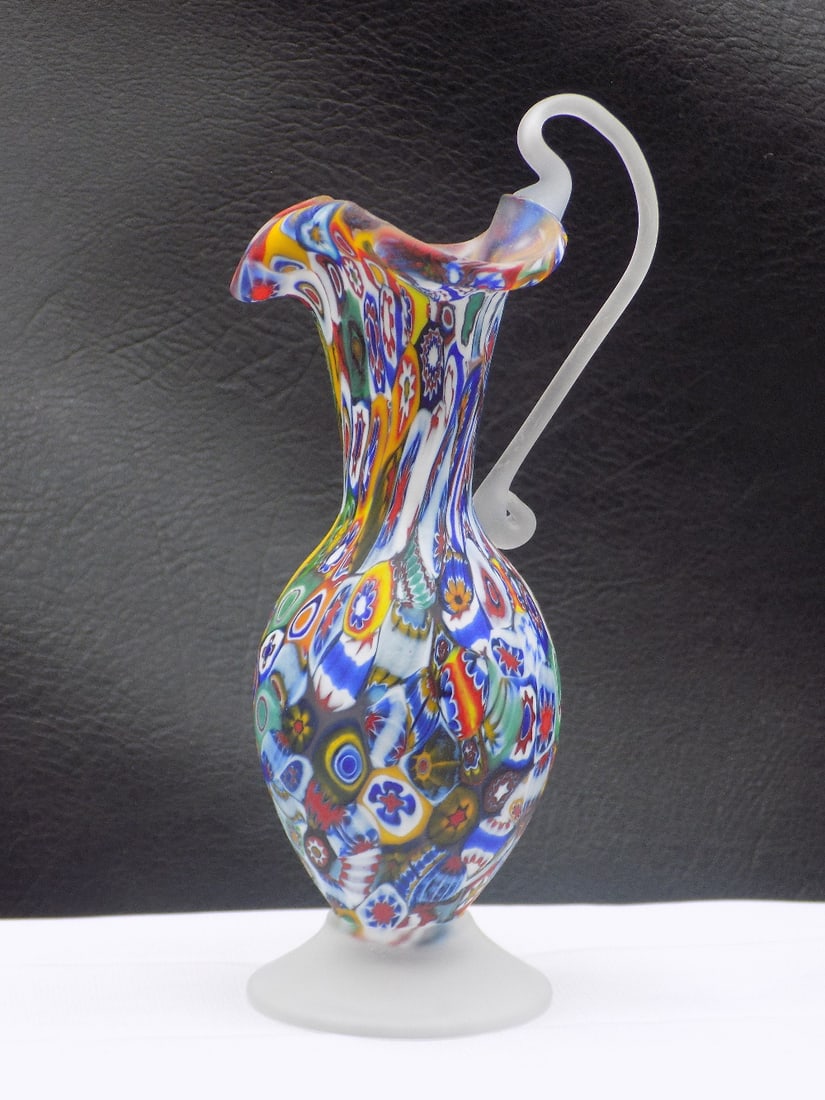 Great vintage Murano millefiori art glass pitcher by Fratelli Toso: Great vintage Murano millefiori art glass pitcher by Fratelli Toso. Beautiful colors. In very good original as found condition. Great quality and detail. 5 ¼ tall. 4.2 ounces. For in house shippi