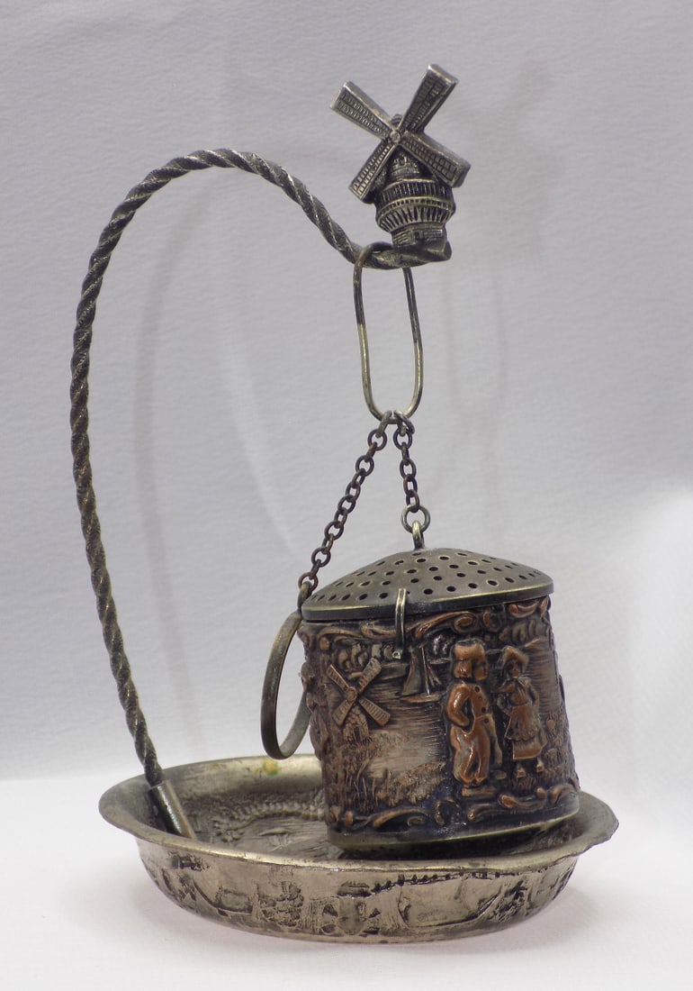 Fancy antique Dutch heavily decorated tea strainer with matching drip stand (1 of 7)