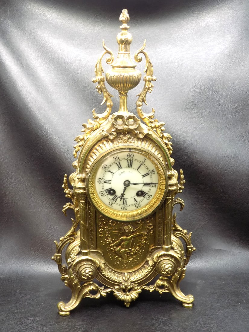 Fancy antique bronze clock with cupid (1 of 8)
