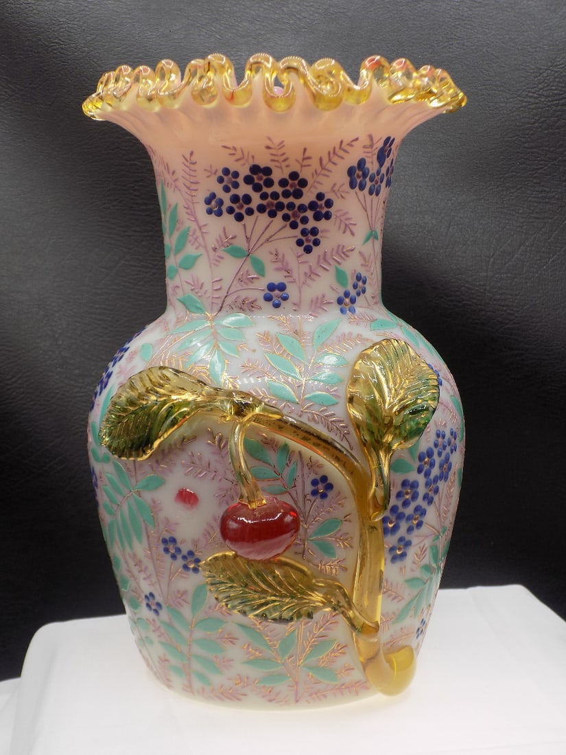 Beautiful vintage Harrach enamel decorated art glass vase with applied fruit: Beautiful vintage Harrach enamel decorated art glass vase with applied fruit. Beautiful enamel decoration. In very good original as found condition. It appears on cherry is missing as shown in photo. 