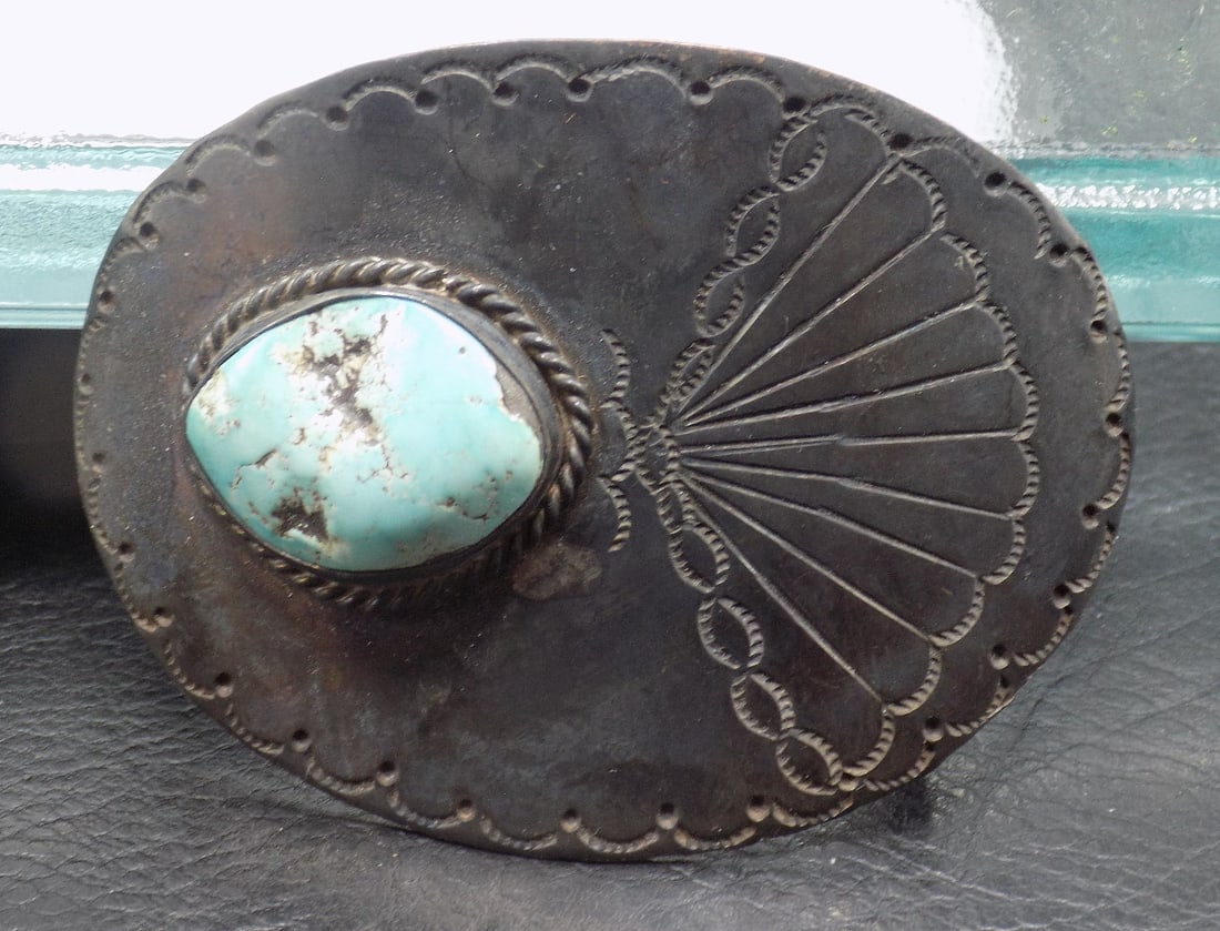 Vintage Native American turquoise coral and sterling silver belt buckle: Vintage Native American turquoise coral and sterling silver belt buckle. Artist signed B T. Measures 2 3/4 by 2 inches. 1.4 ounces. In very good original as found condition. Great quality and detail. 
